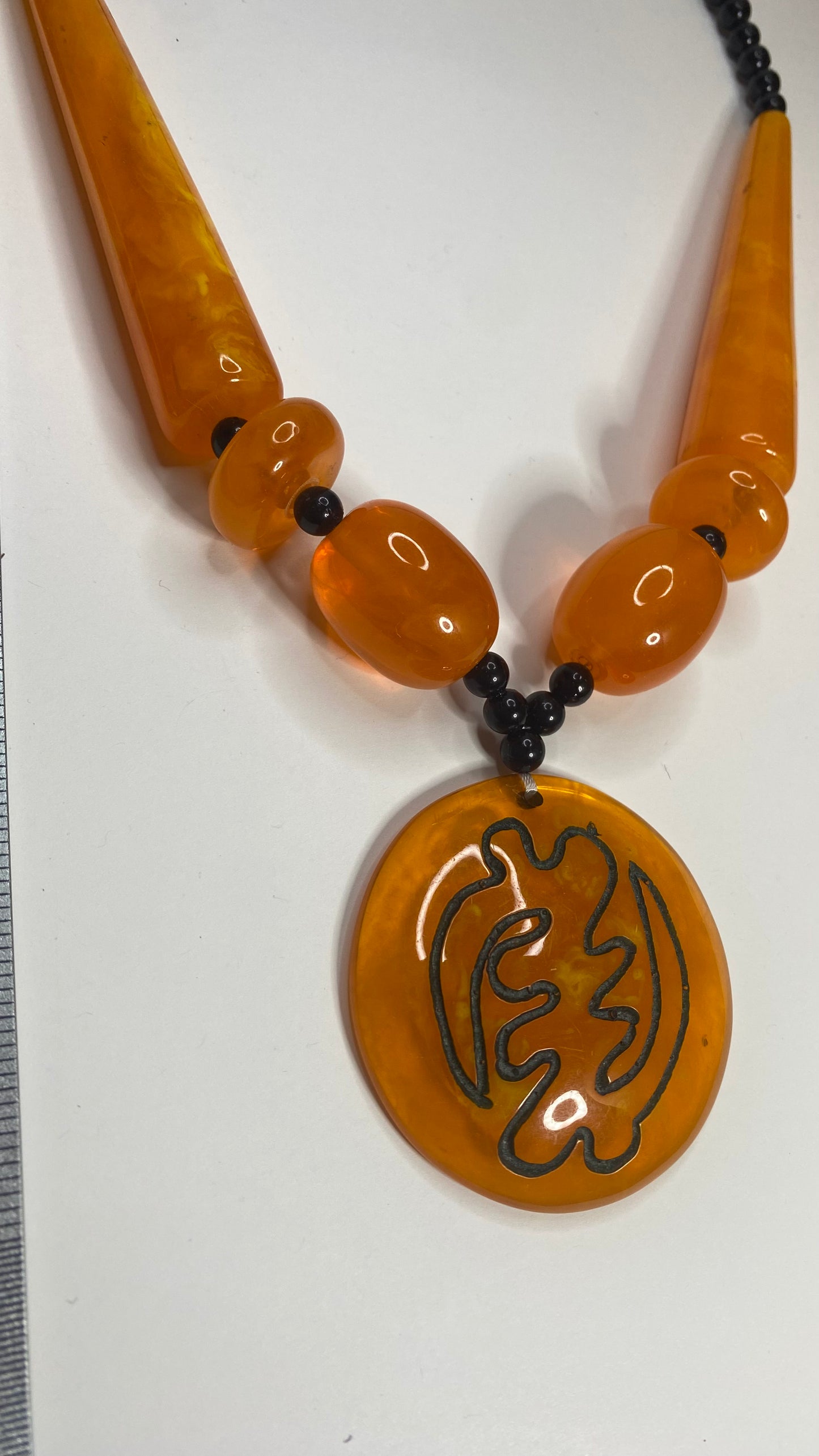 “Gye Nyame”  Resin Necklace in Burnt Orange