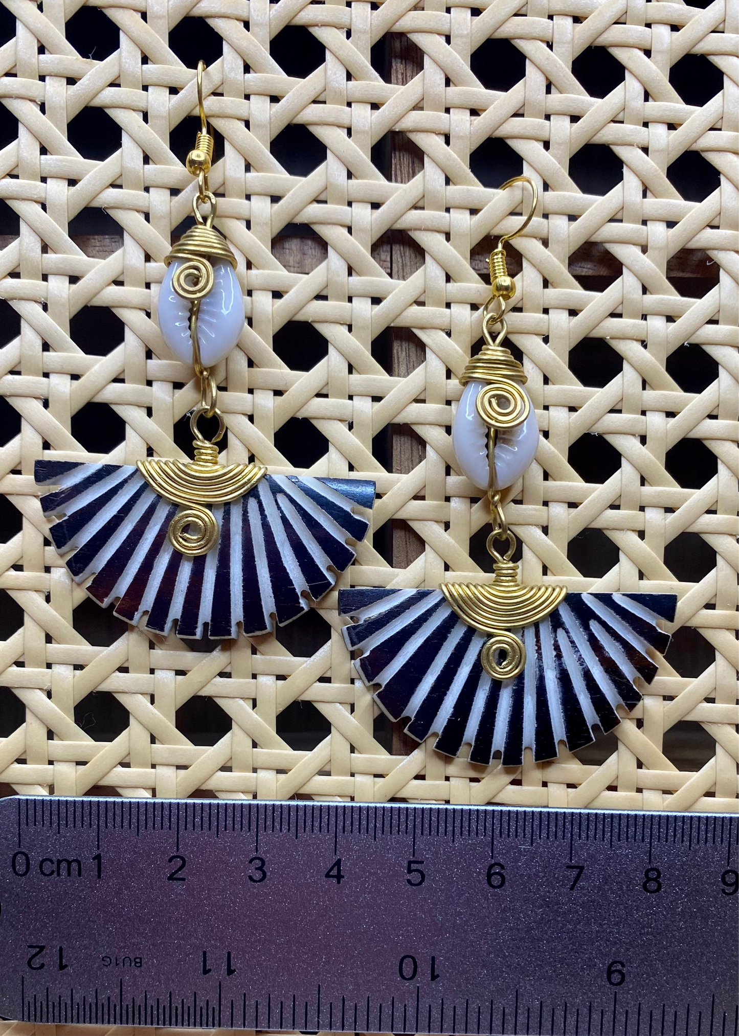 Elegant Hand Carved Fan Earring With Cowry Shell Accent